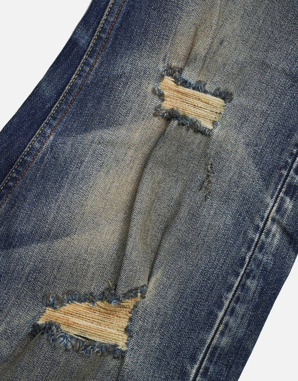 distressed  ripped jeans