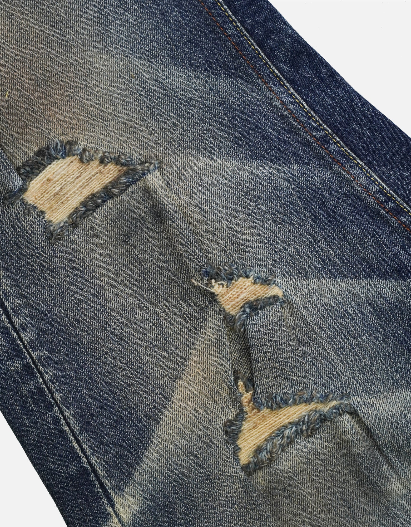 distressed  ripped jeans